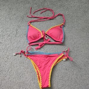 Vibrant Pink Bikini with Yellow and Blue Accents